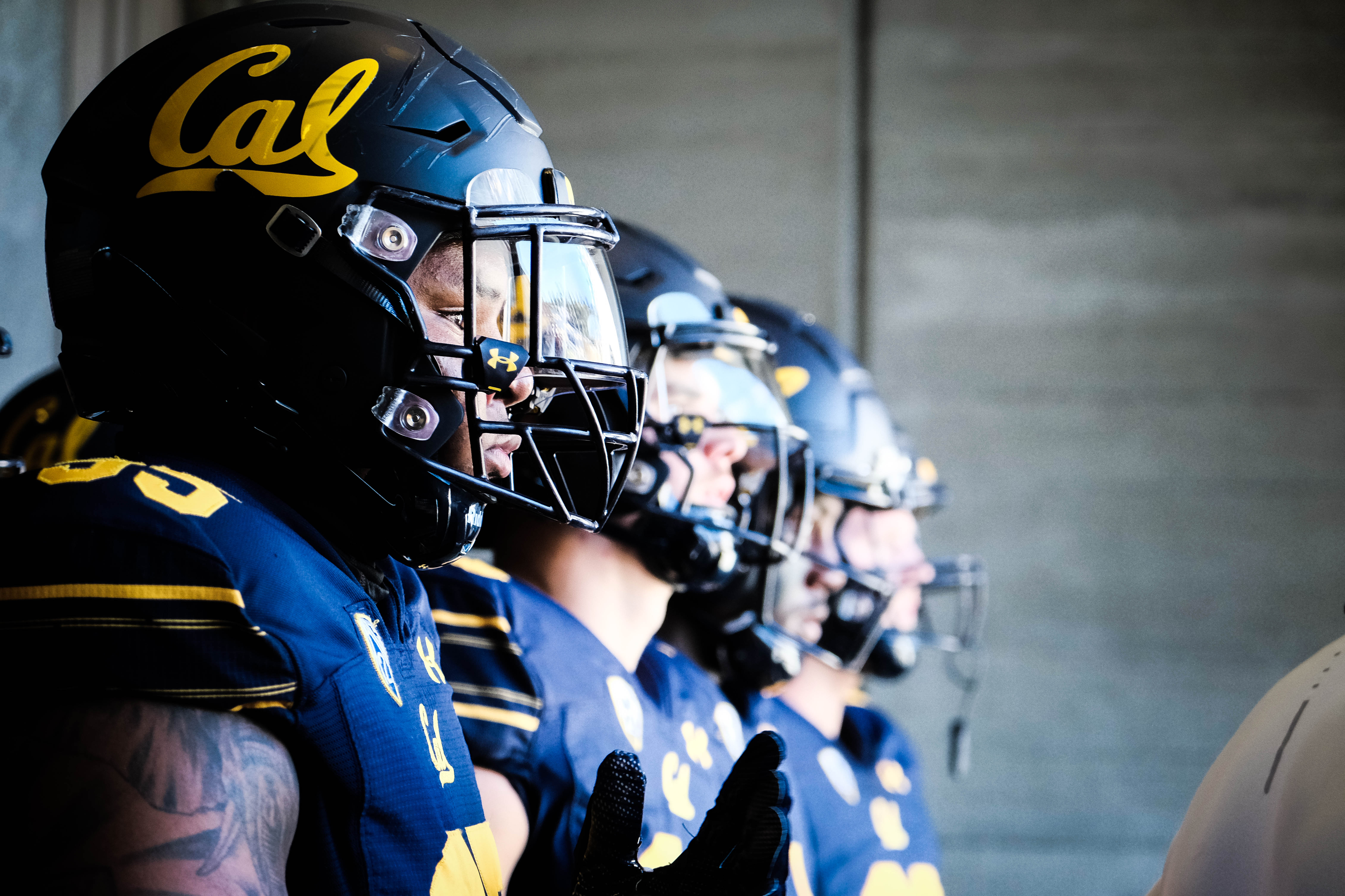 Cal football players prepare for a game